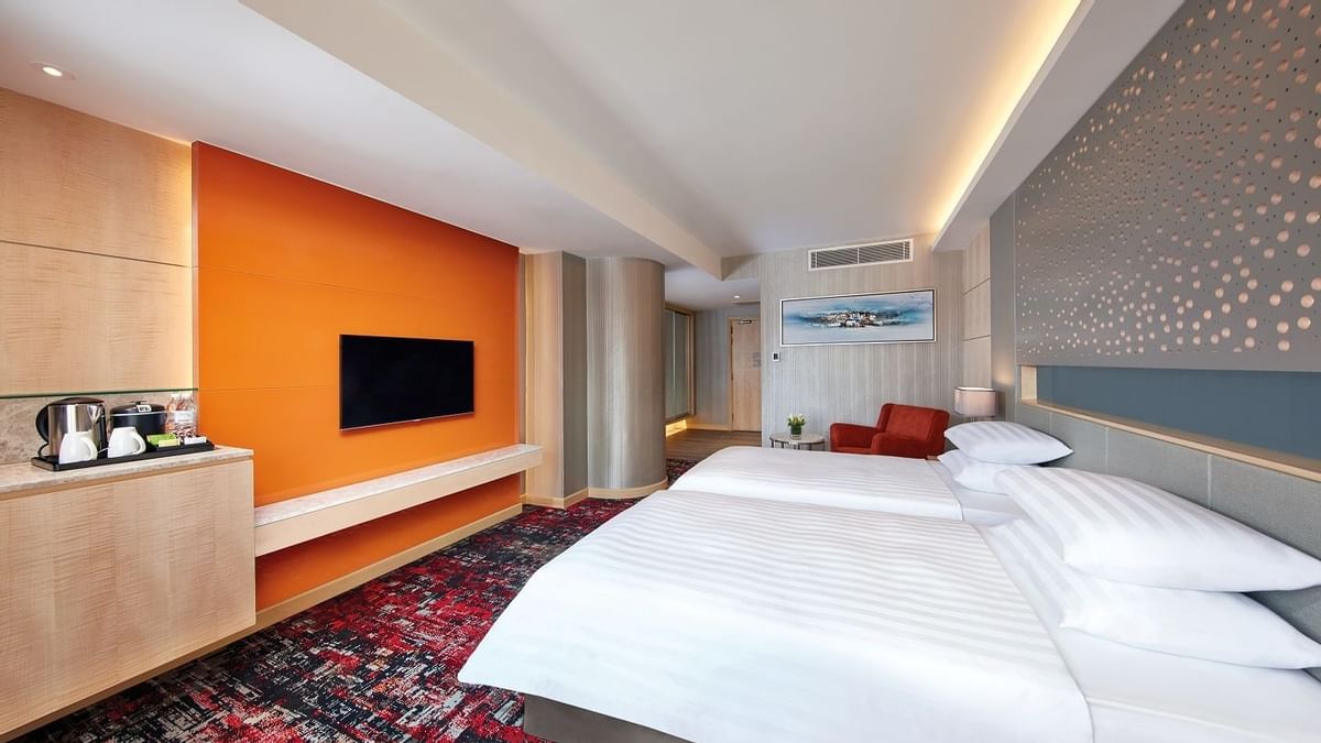 Mini work area with a TV & mirror in Deluxe Plus Twin at Sunway Hotel Big Box