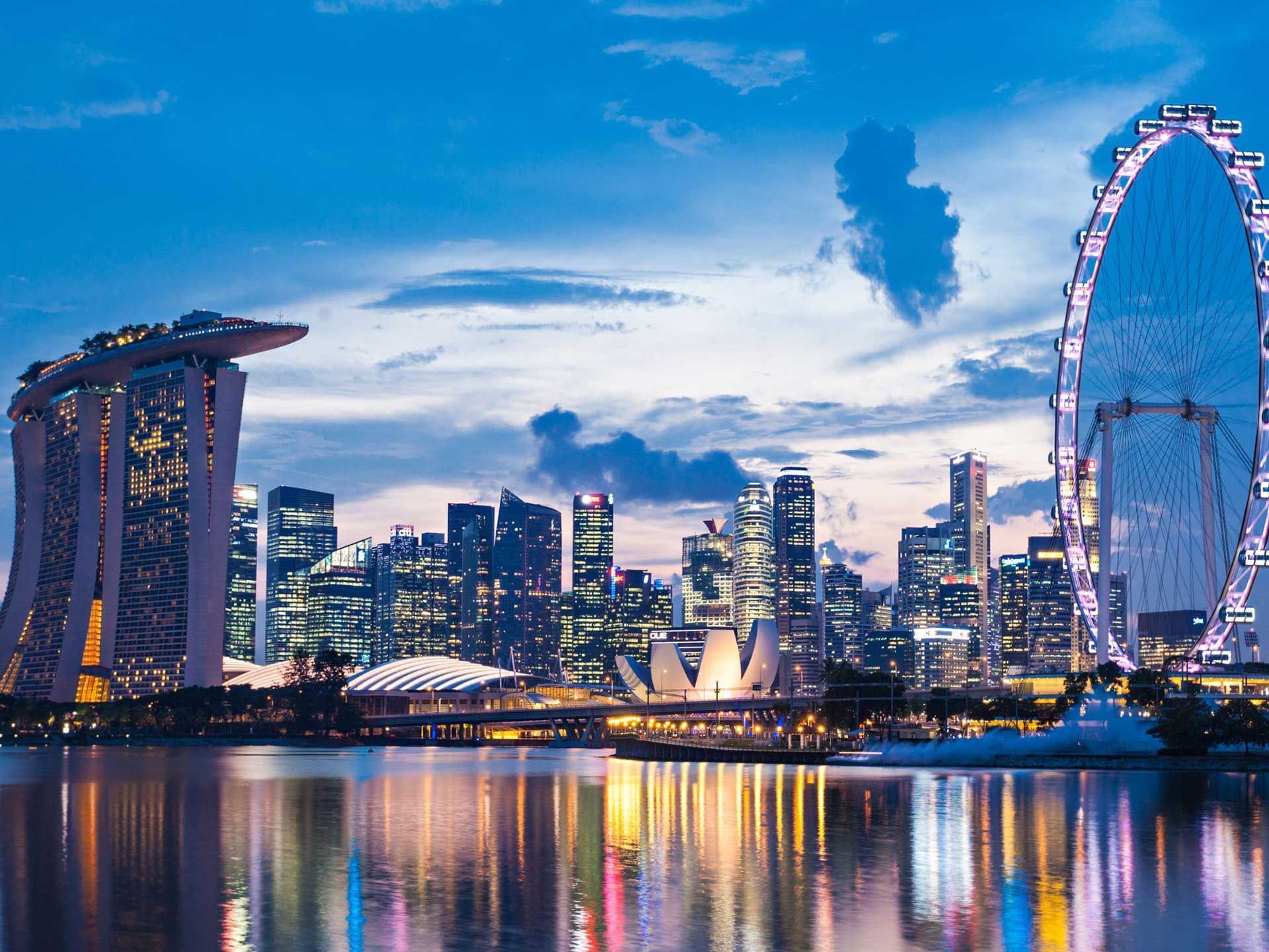 Marina Bay Sand, Singapore Flyer & cityscape captured during sunset near Nostalgia Hotel Singapore