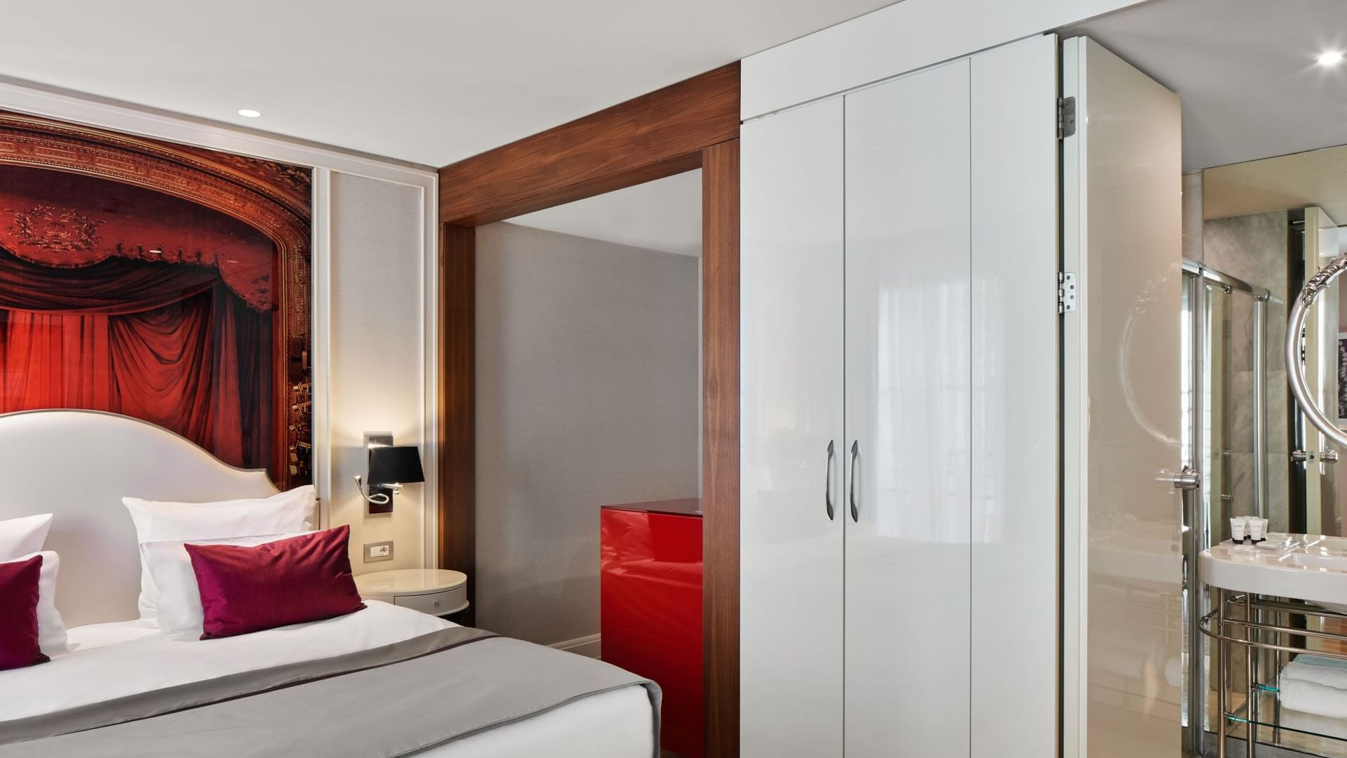 Side cupboard by the cozy bed in Superior Room at Titanic Gendarmenmarkt Berlin