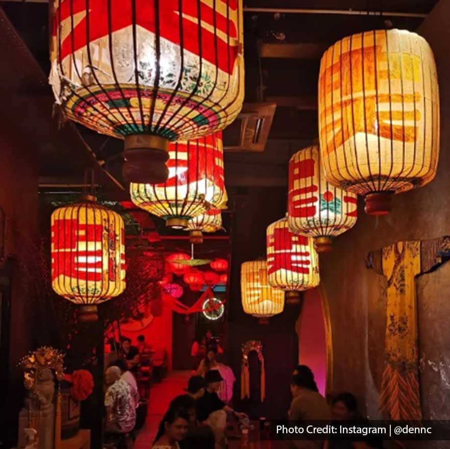 Traditional paper lanterns hang from the ceiling in Manchu Bar - Lexis Suites Penang