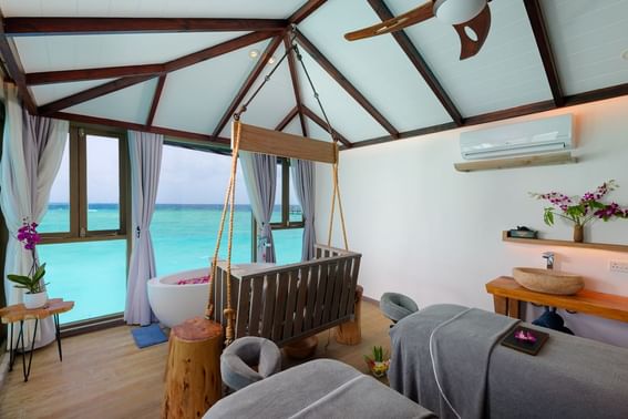 Cozy accommodations with two beds, showcasing an ocean view at Grand Park Kodhipparu, Maldives