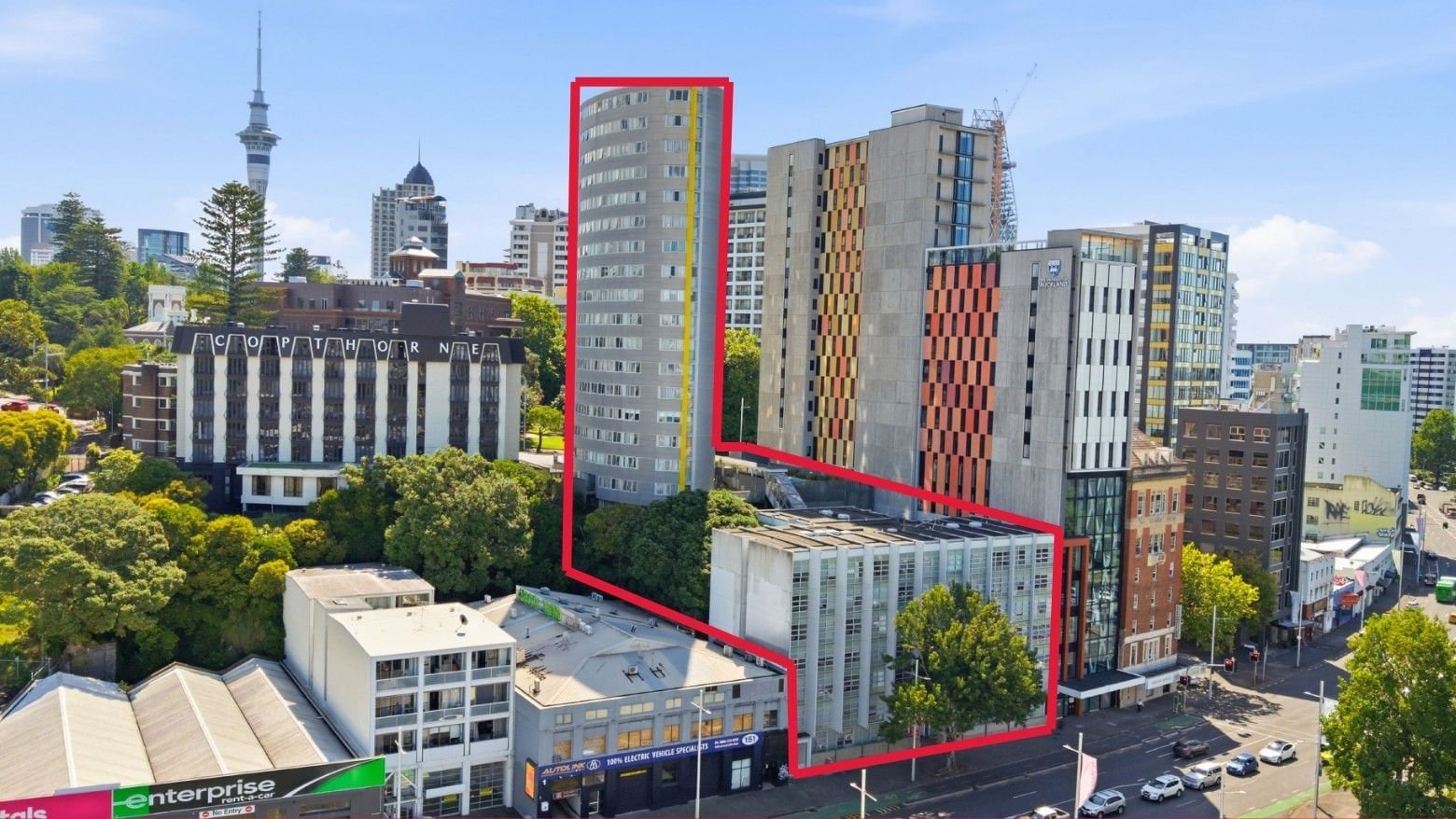 Cityscape of a modern urban area highlighting the Student Living Auckland - Beach building.