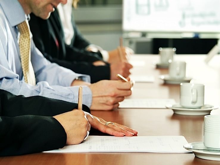 A meeting at the Business Center in Carriage House Hotel