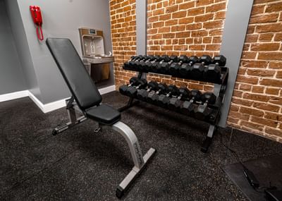 Exercise Machine & weights in the Fitness Center at River Street Inn