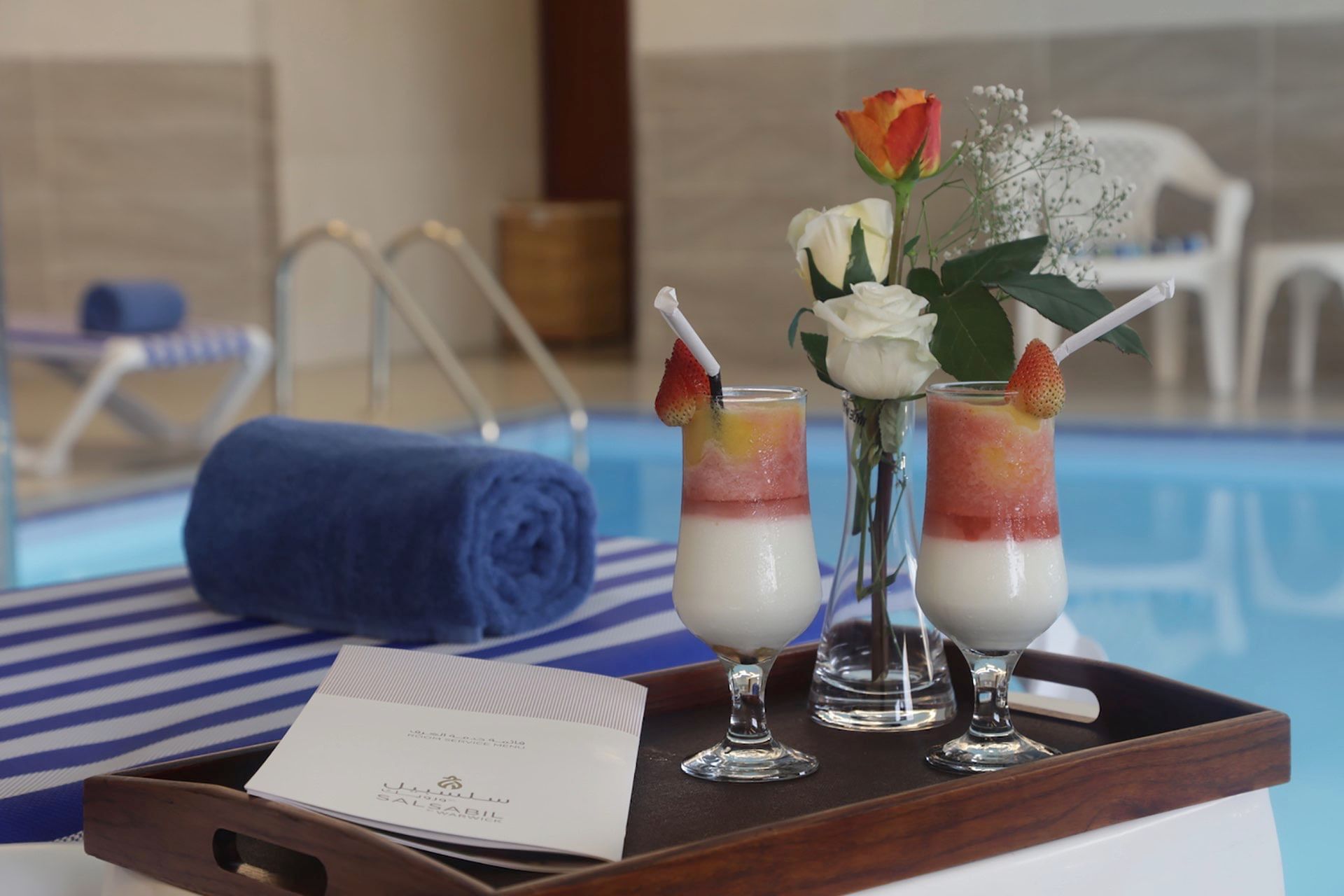 Drinks & amenities served by the swimming pool at Warwick Hotel Jeddah