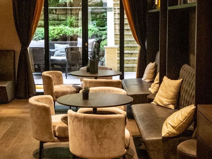 Dining table arrangements with the outdoor view in Emme Restaurant at Margutta 19