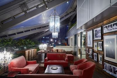 Interior of a lobby area with lounges at Hotel Éclat Beijing