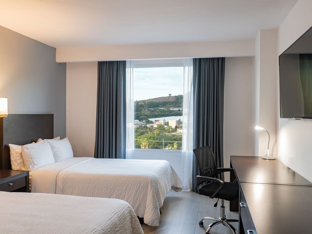 Room with a View, 2 Double with two bed, window and work desk with chair at Fiesta Inn
