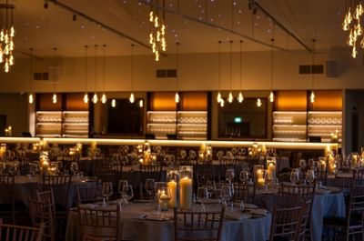 Dinner and bar setup in the evening inside The King Suite