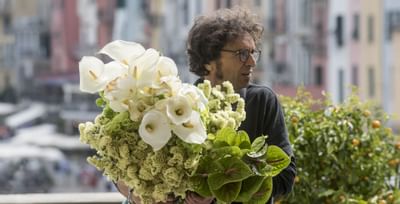 Man with flowers- Grand Hotel Portovenere
