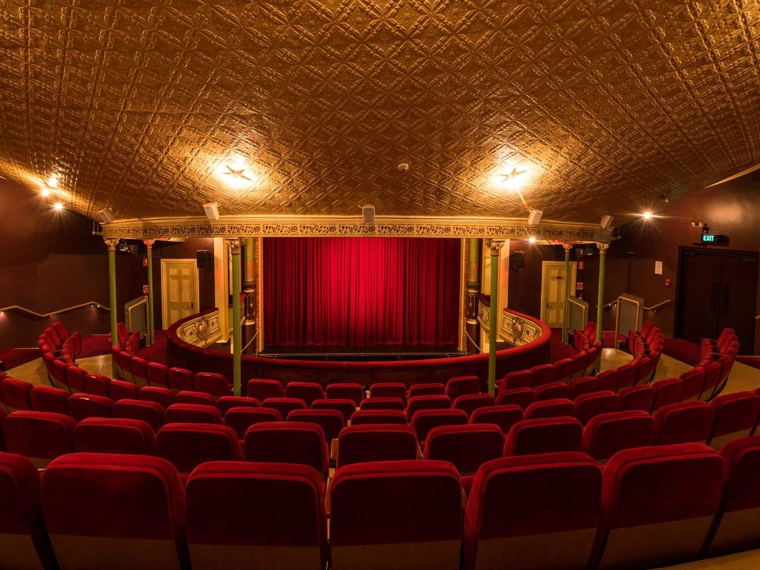 Theatre Royale hall with red seats near Hotel Grand Chancellor Hobart