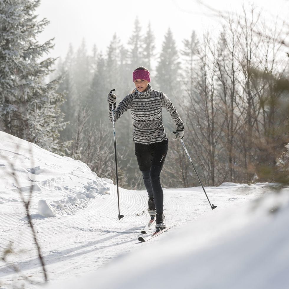 A girl while cross-country skiing near Falkensteiner Hotels
