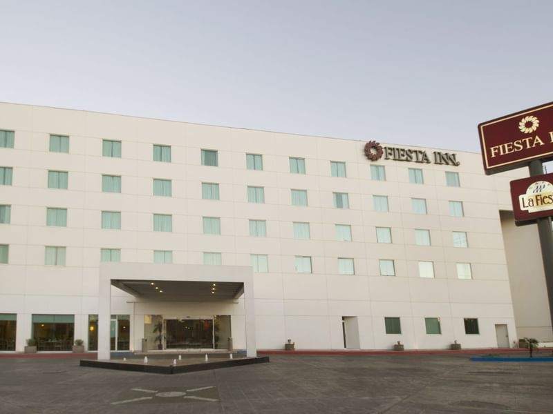 Exterior view of Fiesta Inn Mexicali facade during daytime