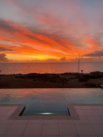Outdoor pool by the beach at H2O Life Style Resort