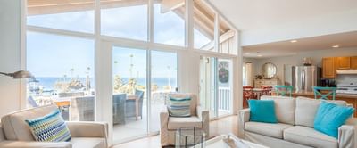 Lounge area in a Room with a balcony overlooking the sea at Catalina Island Company
