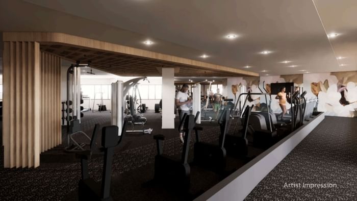 Modern Gym & Fitness Centre with multiple treadmills and exercise machines at UniLodge Brisbane City.