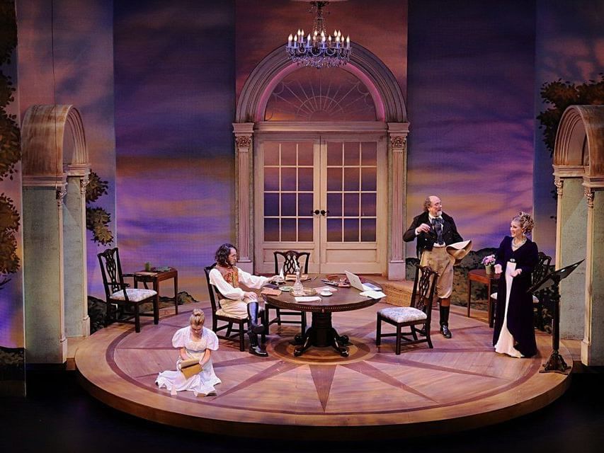 Performers on stage at Swine Palace Theater