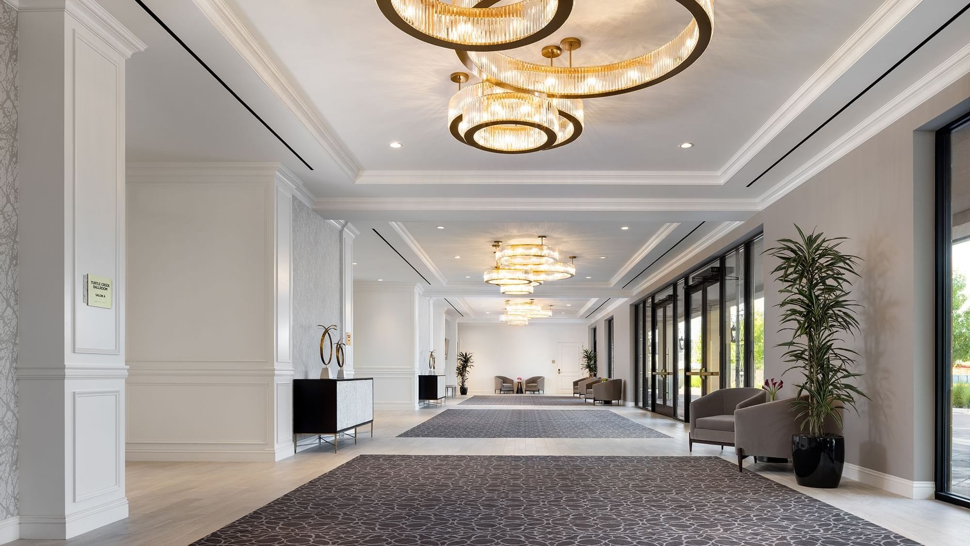 Interior of the hallway with lounges at Warwick Melrose Dallas
