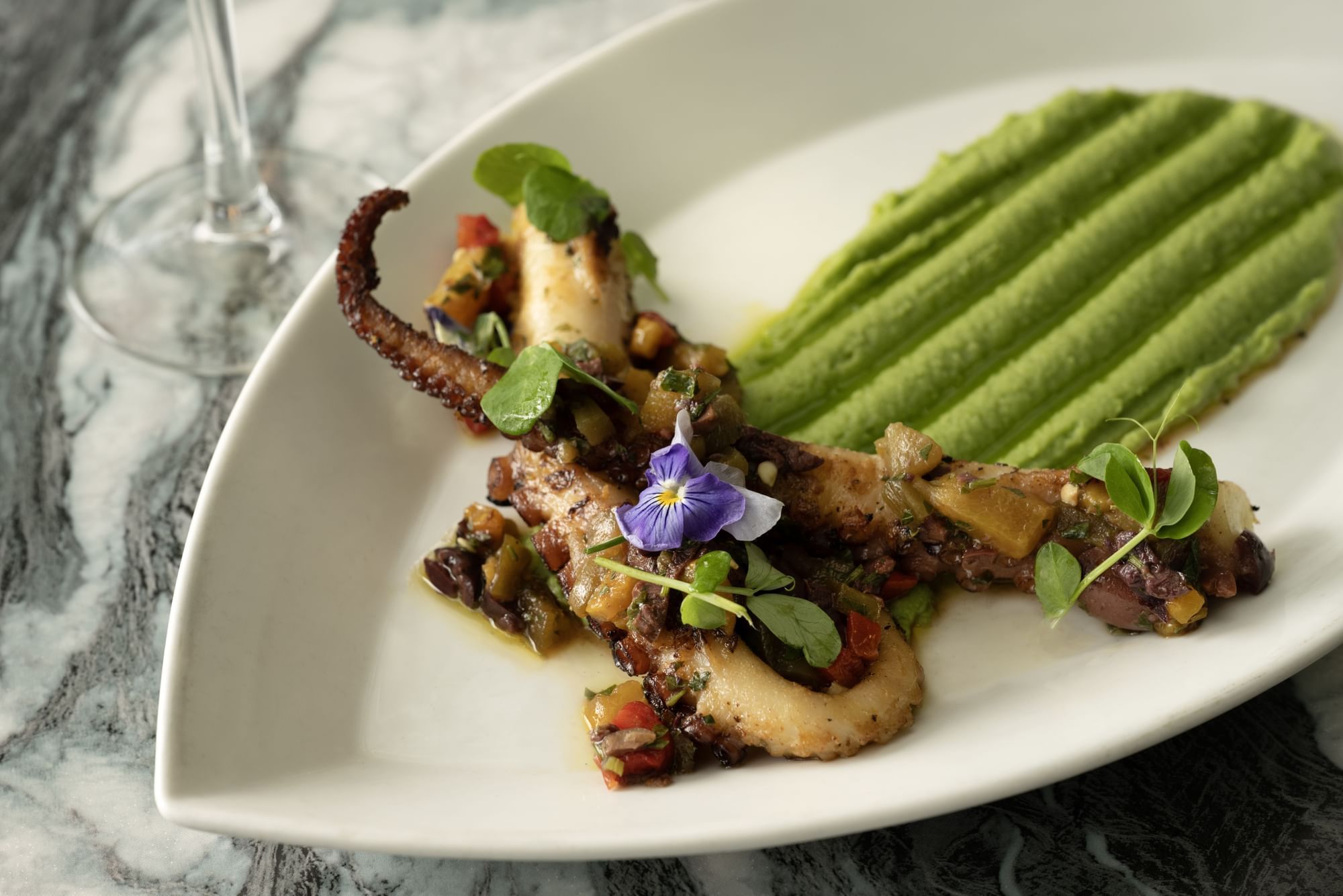 Octopus with a green sauce