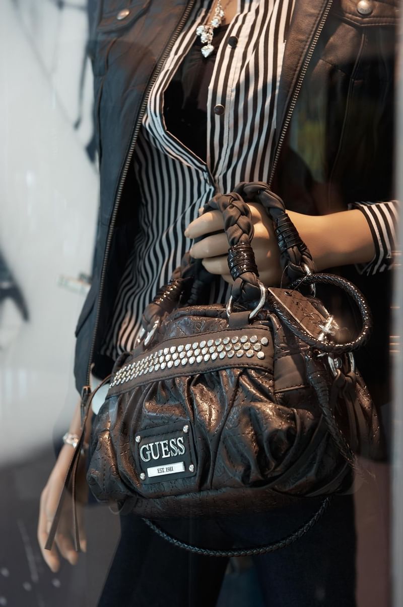 Carrying a bag from the Guess shop at Crown Metropol Melbourne