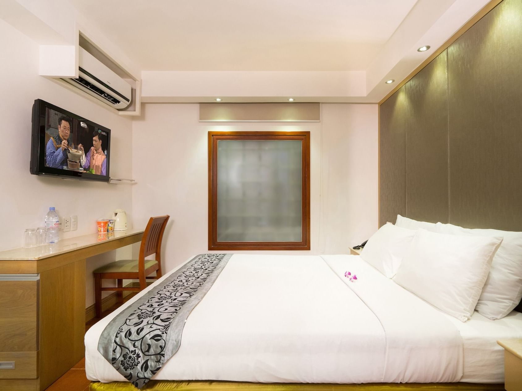 Standard bedroom with TV at Empress Hotel Saigon  