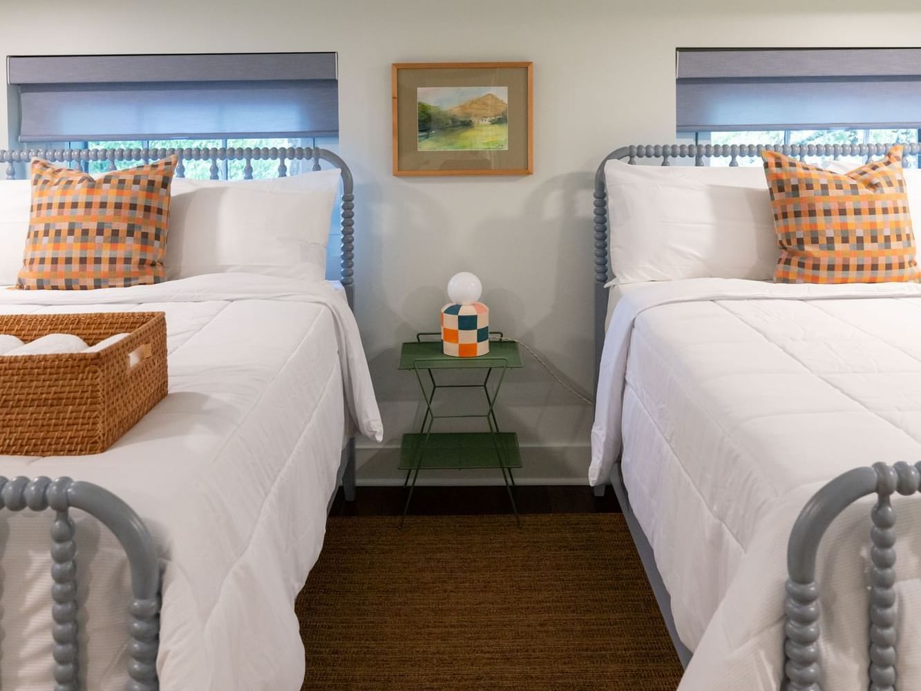 Classic Two Queen Suite with white bedding and nightstand at The Ashbrook Hotel, featuring Frankfort Kentucky lodging.