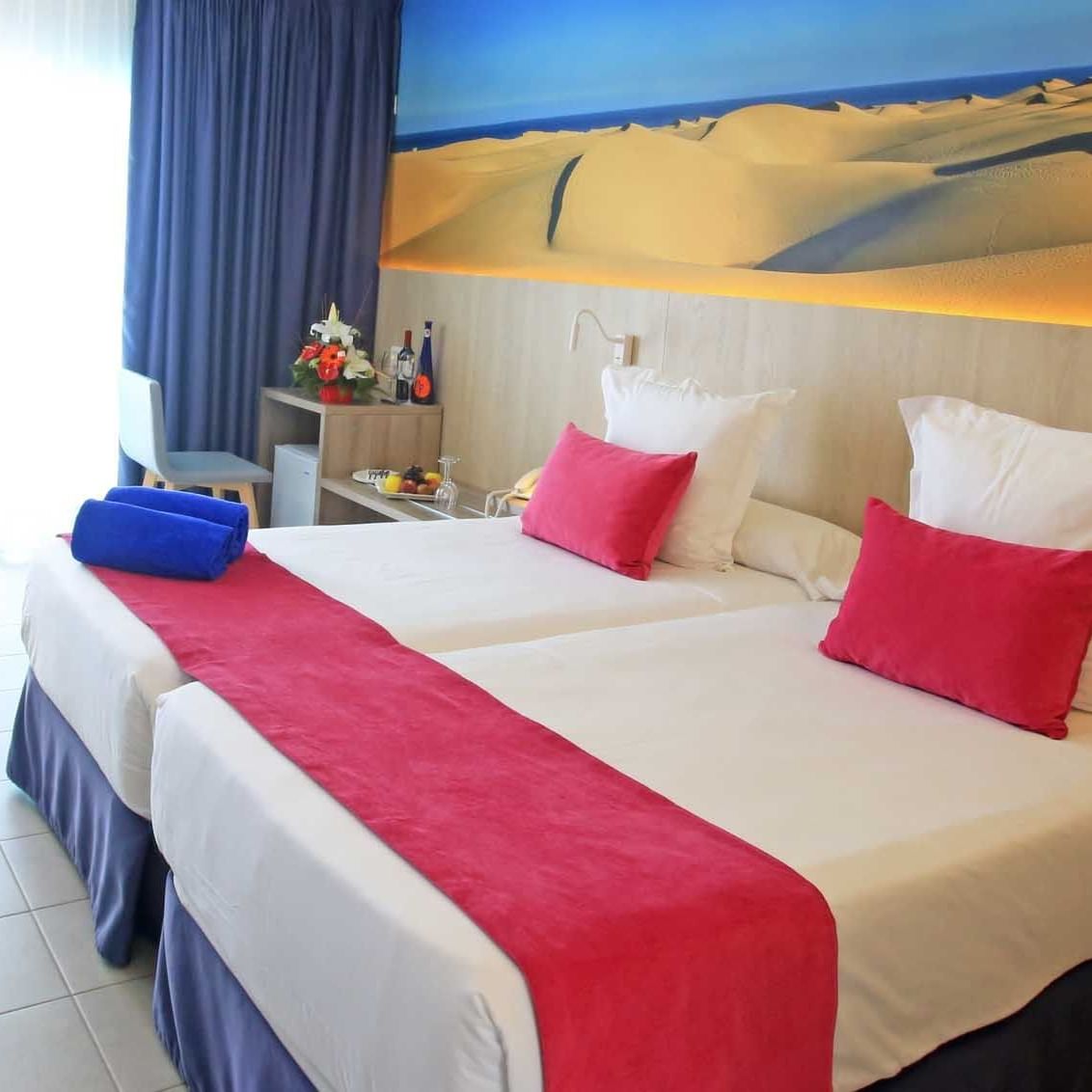 Twin beds & wall Art in Deluxe Twin Room at Labranda Marieta