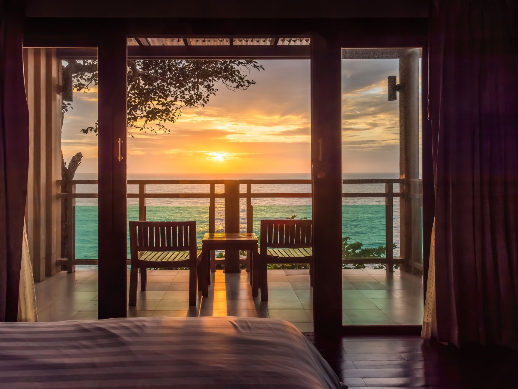 View of the ocean from a bedroom balcony at Sunseeker Resort