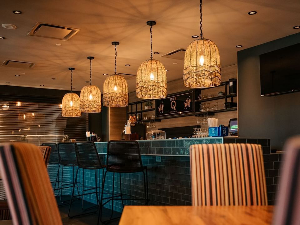 Bar counter & lounge area in Sicilia with a warm ambience at Las Casitas Village