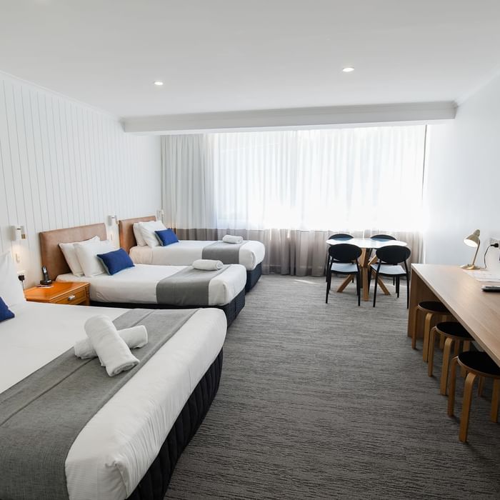 Three well-appointed hotel rooms with a large living area at Mercure Charlestown.