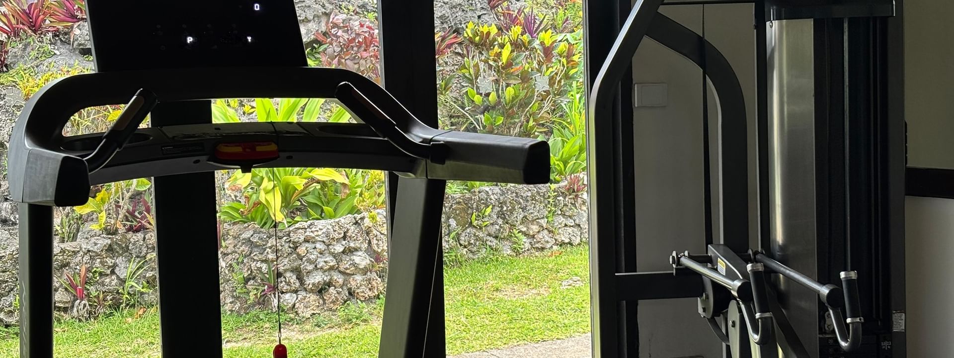 Treadmill and Nautilus gym equipment in a bright room at Warwick Le Lagon - Vanuatu, Efate.