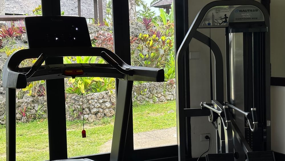 Treadmill and Nautilus gym equipment in a bright room at Warwick Le Lagon - Vanuatu, Efate.