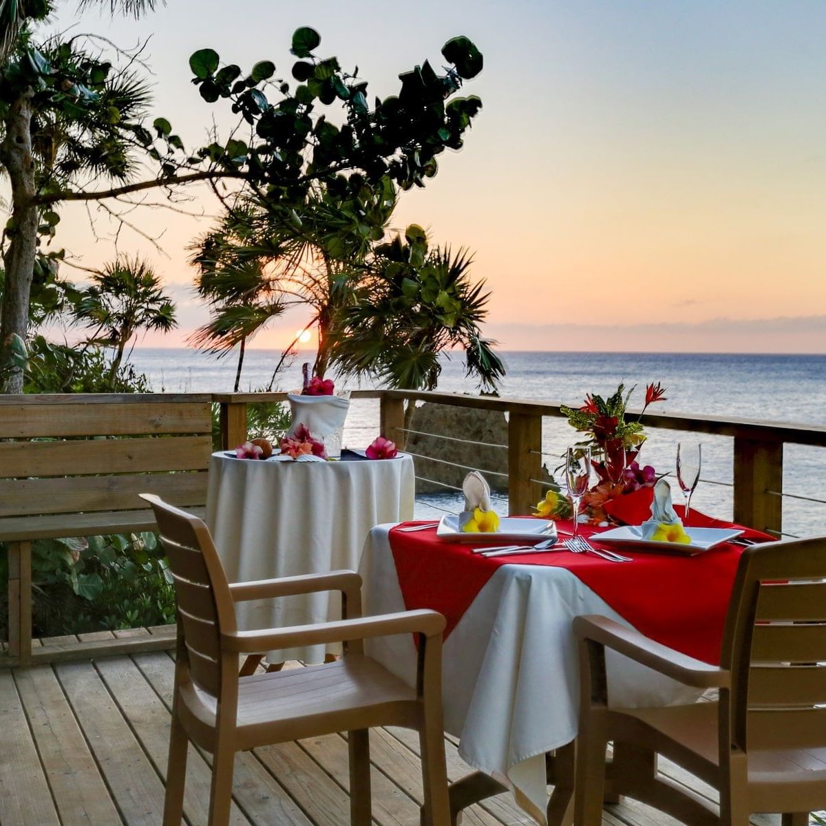 private dining table on balcony with ocean view