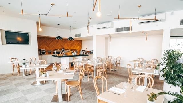 Seating area of Madison Kitchen & Bar at Mercure Charlestown