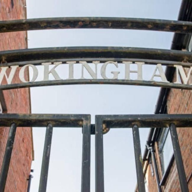 Image of Wokingham town's sign for the History of Wokingham