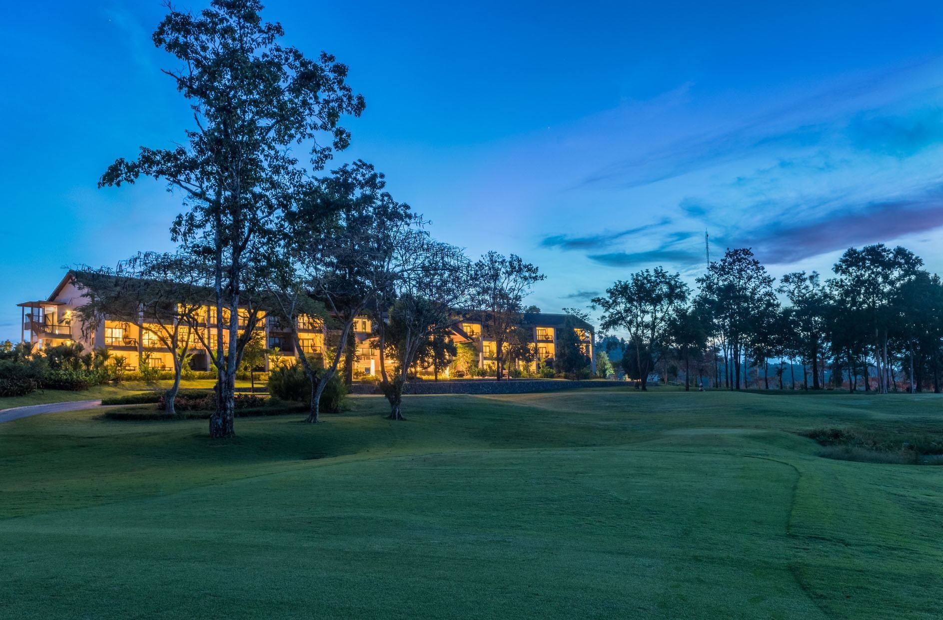 View of Chatrium Golf Resort from the garden during the night