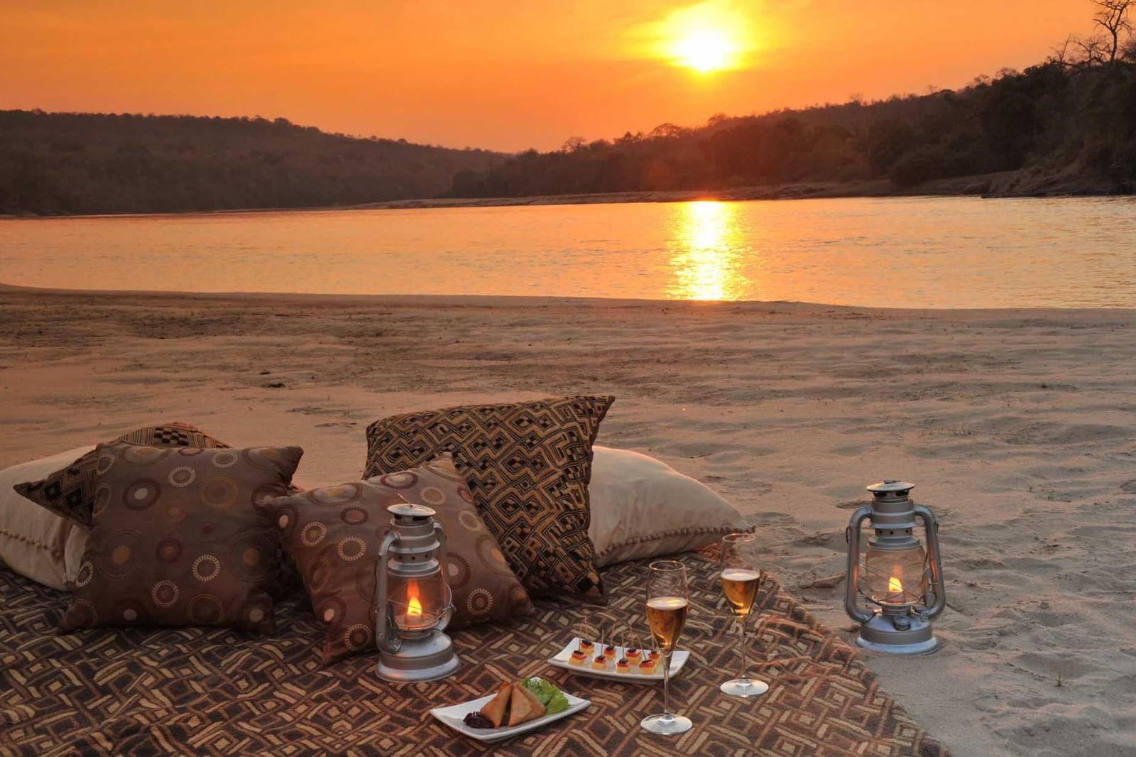 Sandbank Sundowners by the river at Serena Mivumo River Lodge