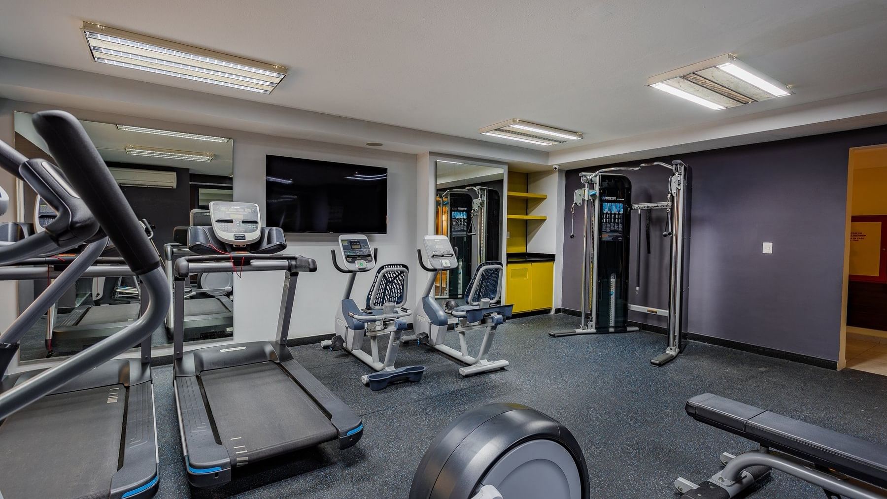 Exercise Machines in a Gymnasium at Gamma Hotels