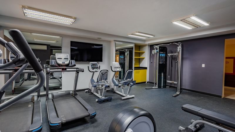 Exercise Machines in a Gymnasium at Gamma Hotels