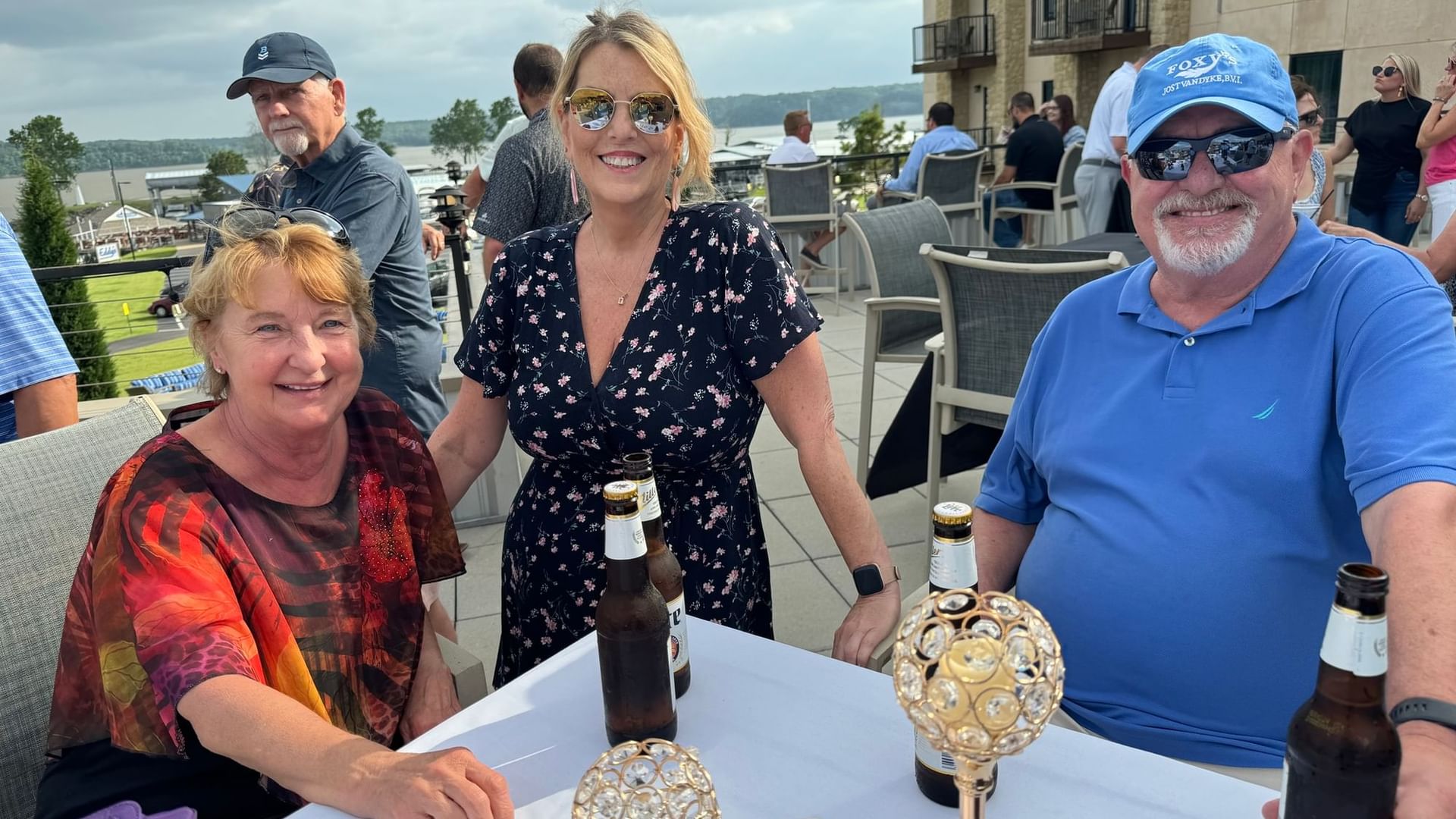 Group of friends enjoys drinks on Rooftop Patio at Shangri-La Monkey Island