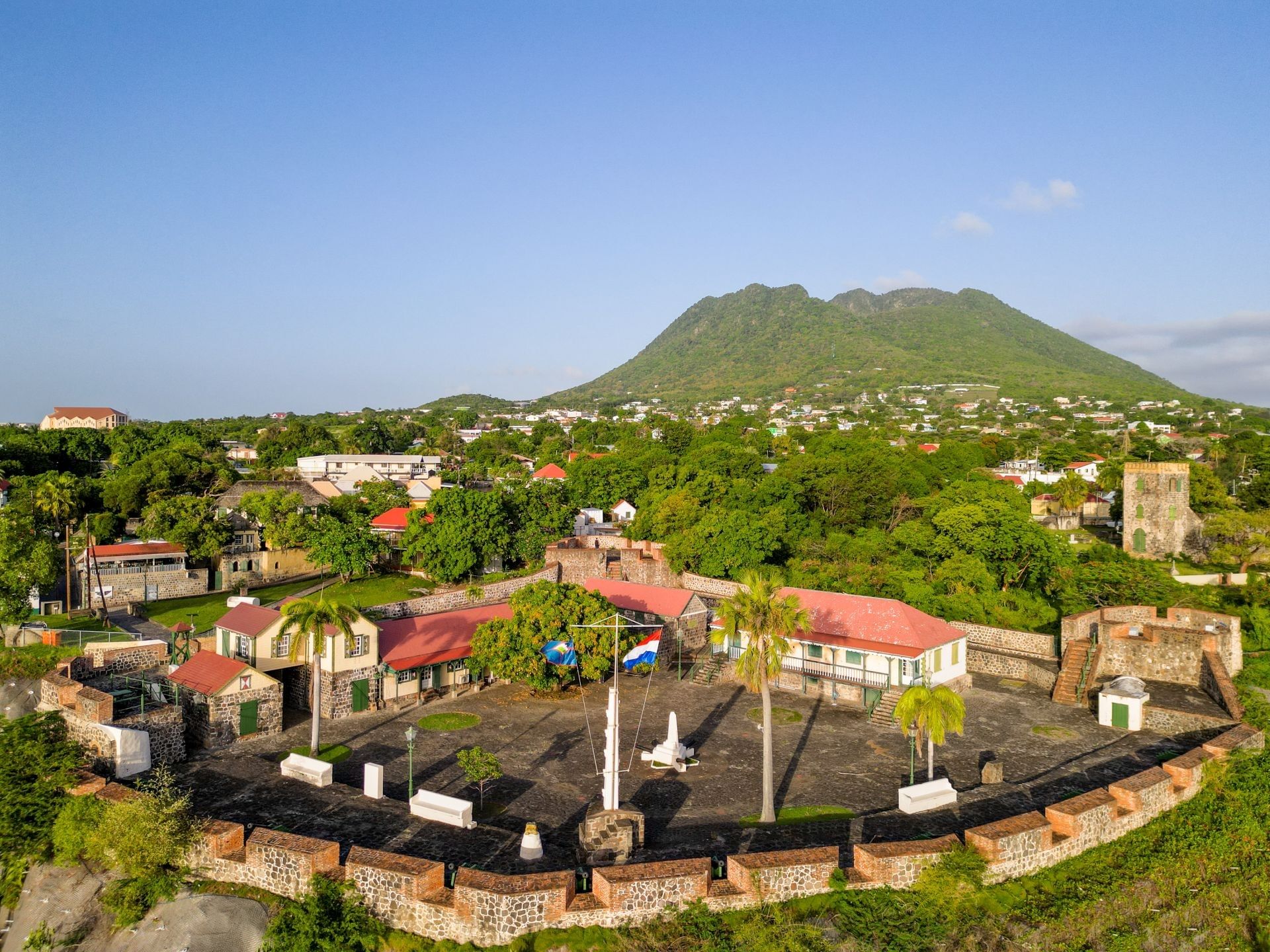 Aerial view of historic Fort Oranje with mountain view in Sint Eustatius town center near Golden Rock Resort