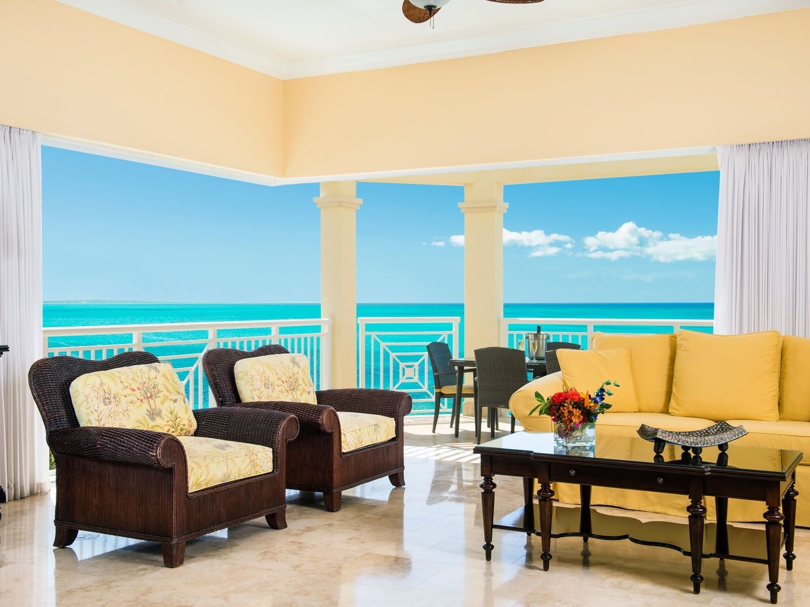 Living room of 2 Bedroom Oceanfront Penthouse with Roof Terrace at Windsong Resort On The Reef