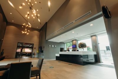 Reception and lobby area with seating at Araiza San Luis