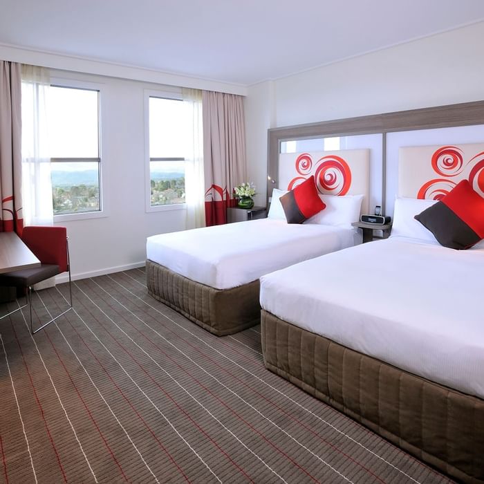 Two queen-size beds in Standard Room at Novotel Glen Waverley