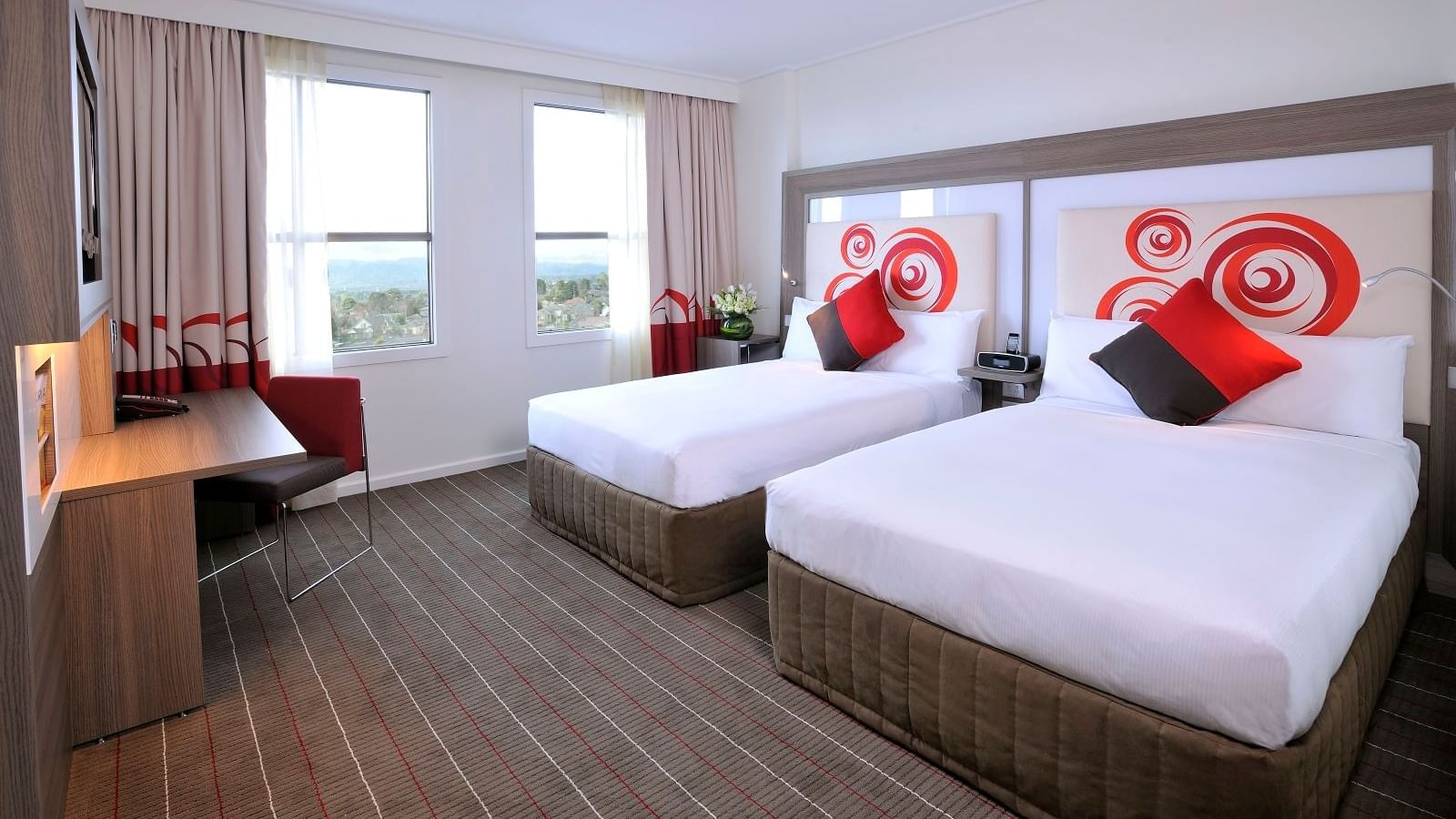 Two queen-size beds in Standard Room at Novotel Glen Waverley