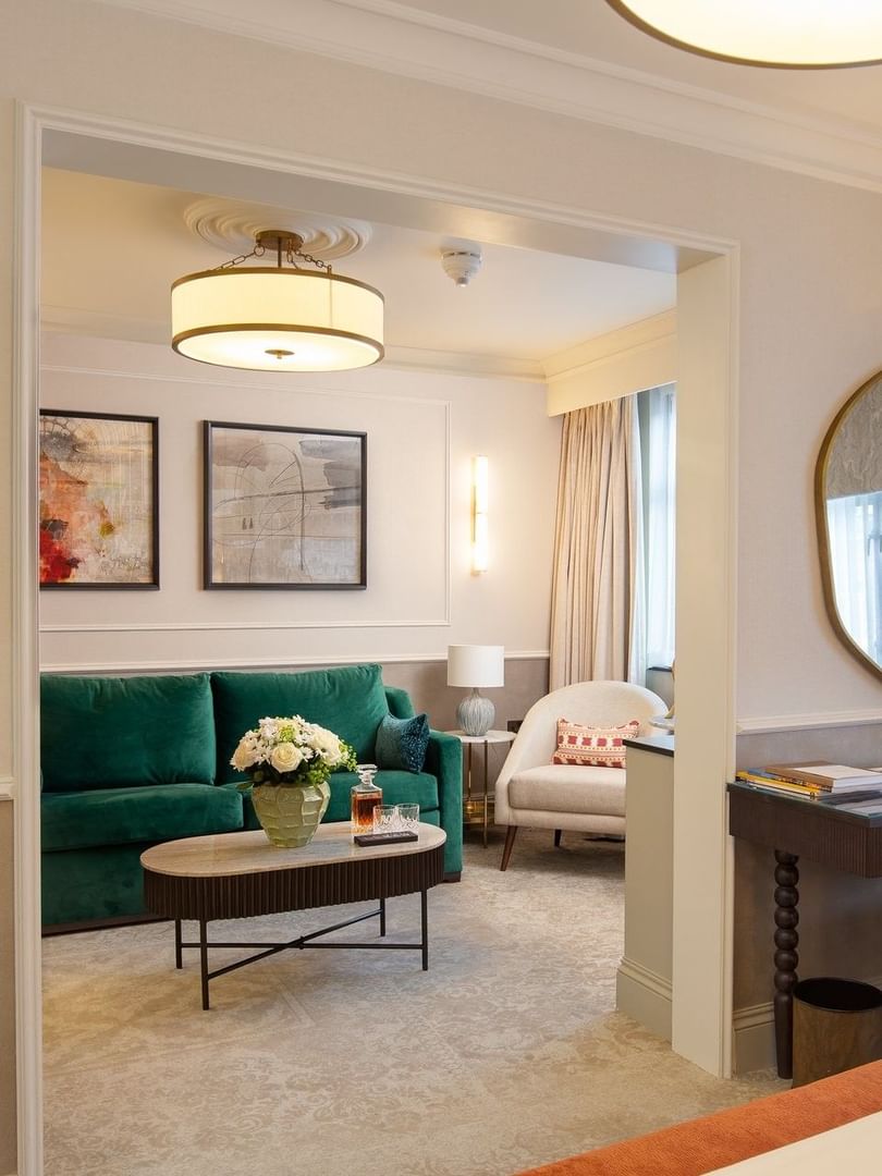 Elegant suite with living area and bedroom at The Capital Hotel, Apartments & Townhouse