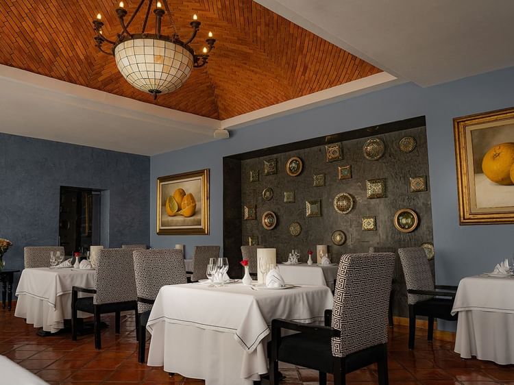 Elegant interior with decorative walls in Canto Del Mar restaurant at Marquis Los Cabos Resort