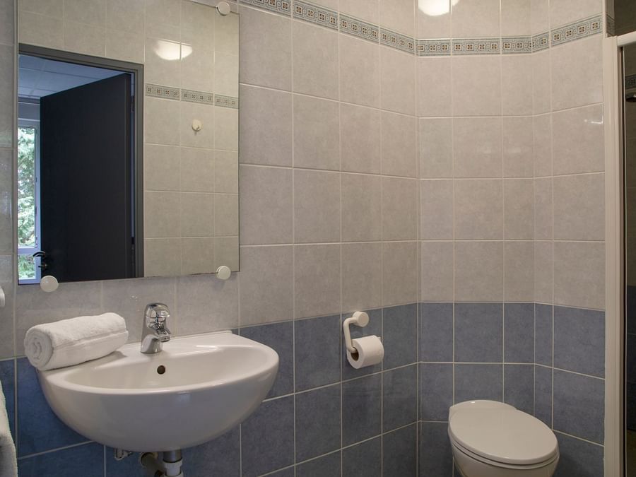Bathroom vanity in bedrooms at Le Clos de l'Orgerie