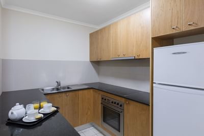 1 Bedroom Apartment kitchen at Nesuto Canberra Apartment