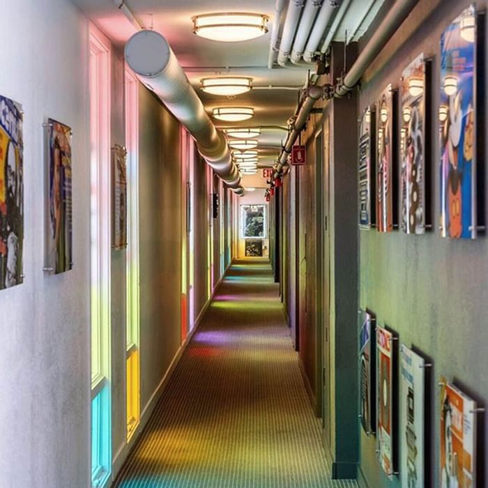 Interior of a hallway with album cover at Backstage at the Verb